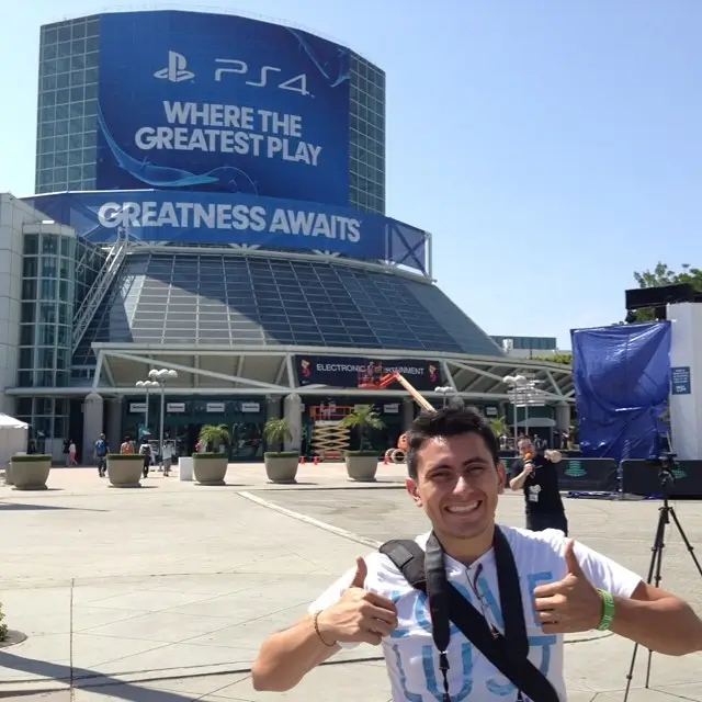 Darryl standing outside the Los Angeles Convention Center during E3 2014, with event signage and crowds visible in the background.